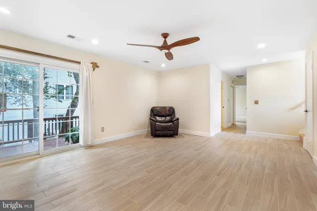 a bathroom with a sink a mirror and a shower