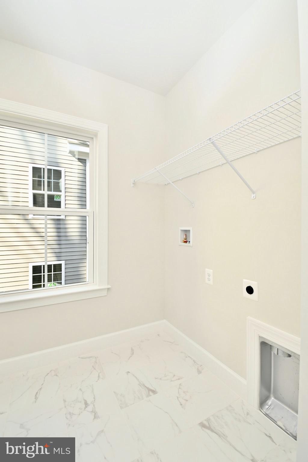 6216 Garden Road Springfield, VA 22152 - Photo 37 of 60 Laundry room Bedroom top of Stairs