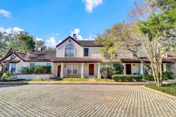a front view of a house with swimming pool