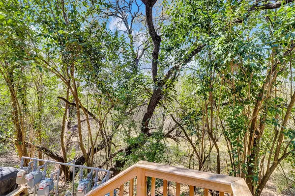 a view of deck with wooden floor and fence