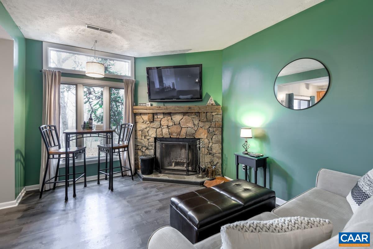 454 3 Ridges Wintergreen, VA 22967 - Photo 2 of 14 a living room with furniture and a fireplace
