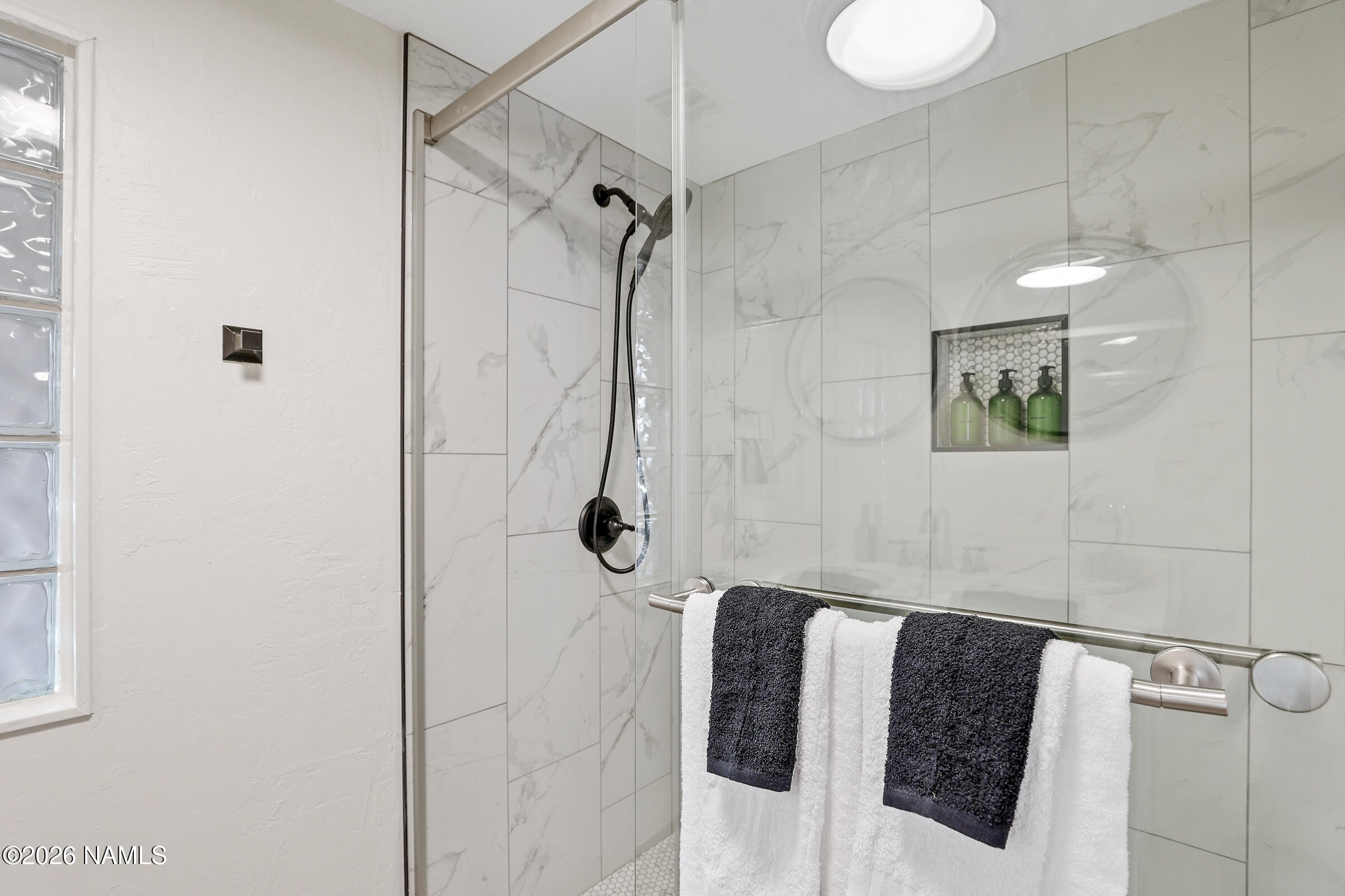 715 Trout Creek Road Munds Park, AZ 86017 - Photo 19 of 46 a bathroom with a shower