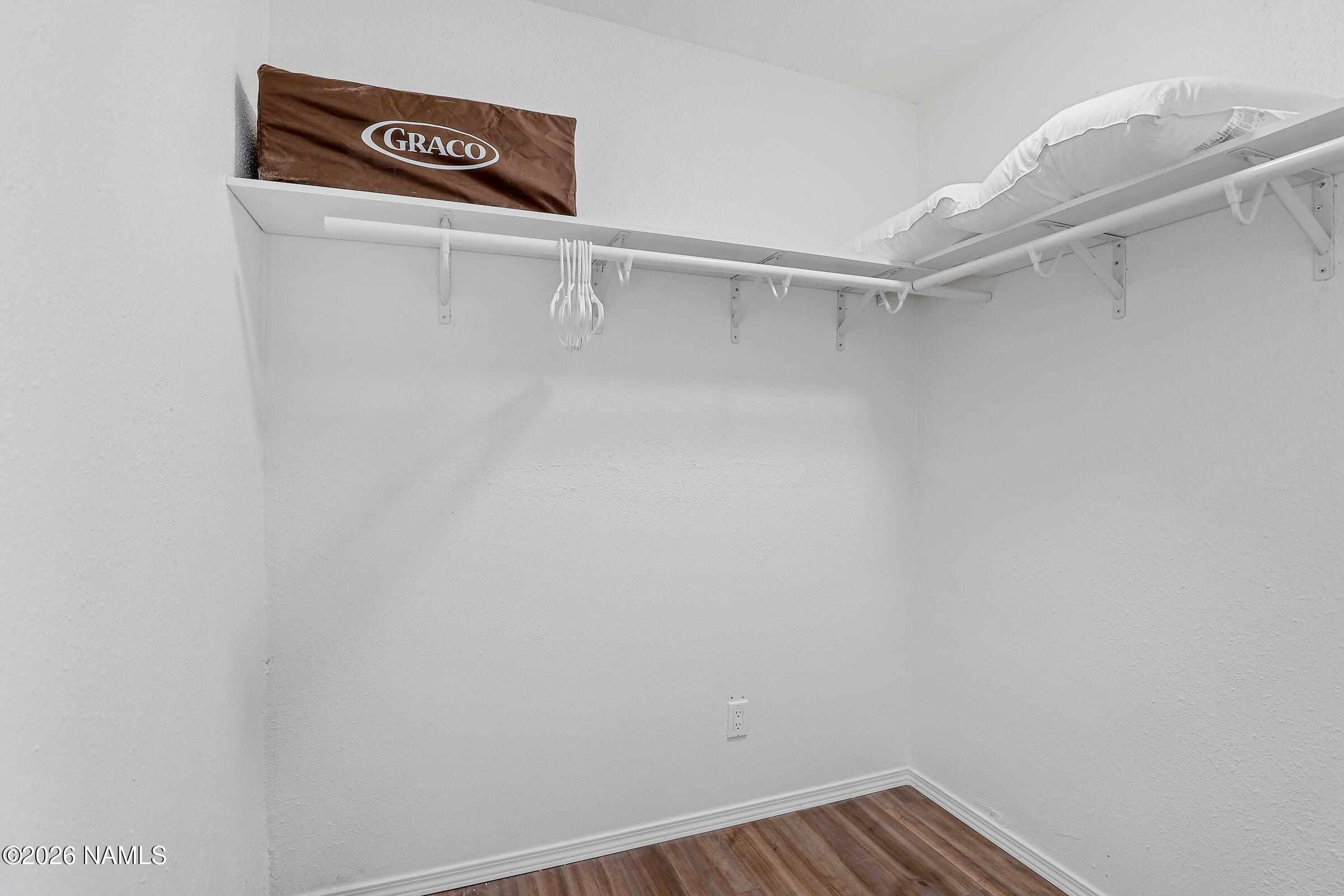 715 Trout Creek Road Munds Park, AZ 86017 - Photo 20 of 46 a view of a room with racks on the wall