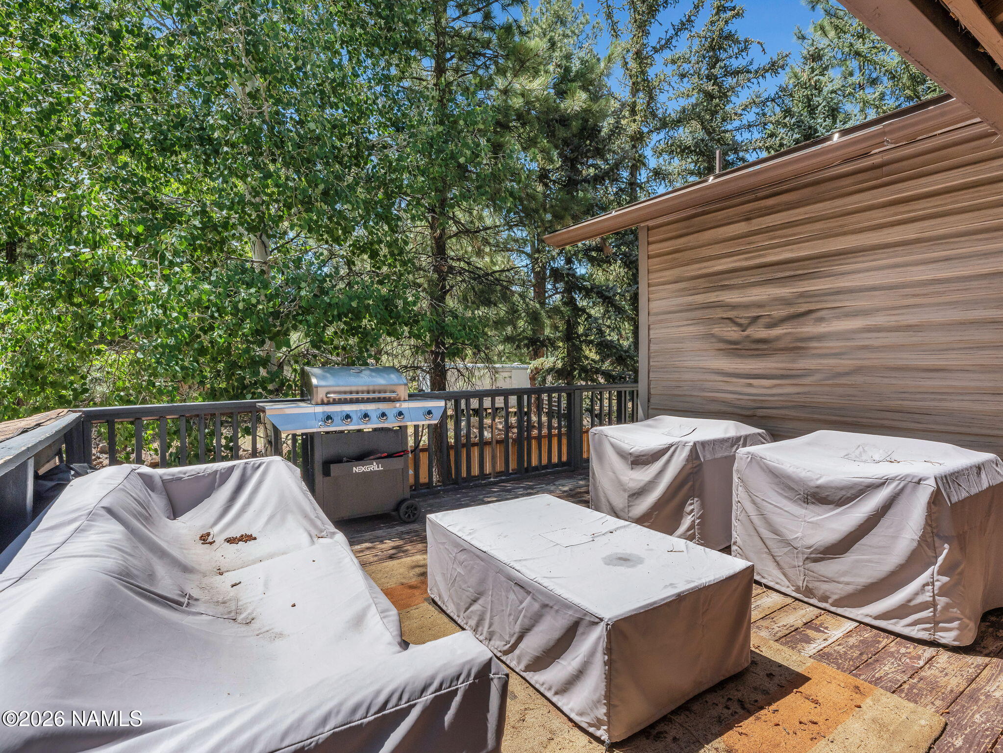 715 Trout Creek Road Munds Park, AZ 86017 - Photo 41 of 46 a view of a patio in a balcony
