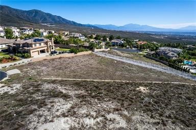 5049 Morgan Place Rancho Cucamonga, CA 91737 - Photo 3 of 5 a view of a street with a mountain view