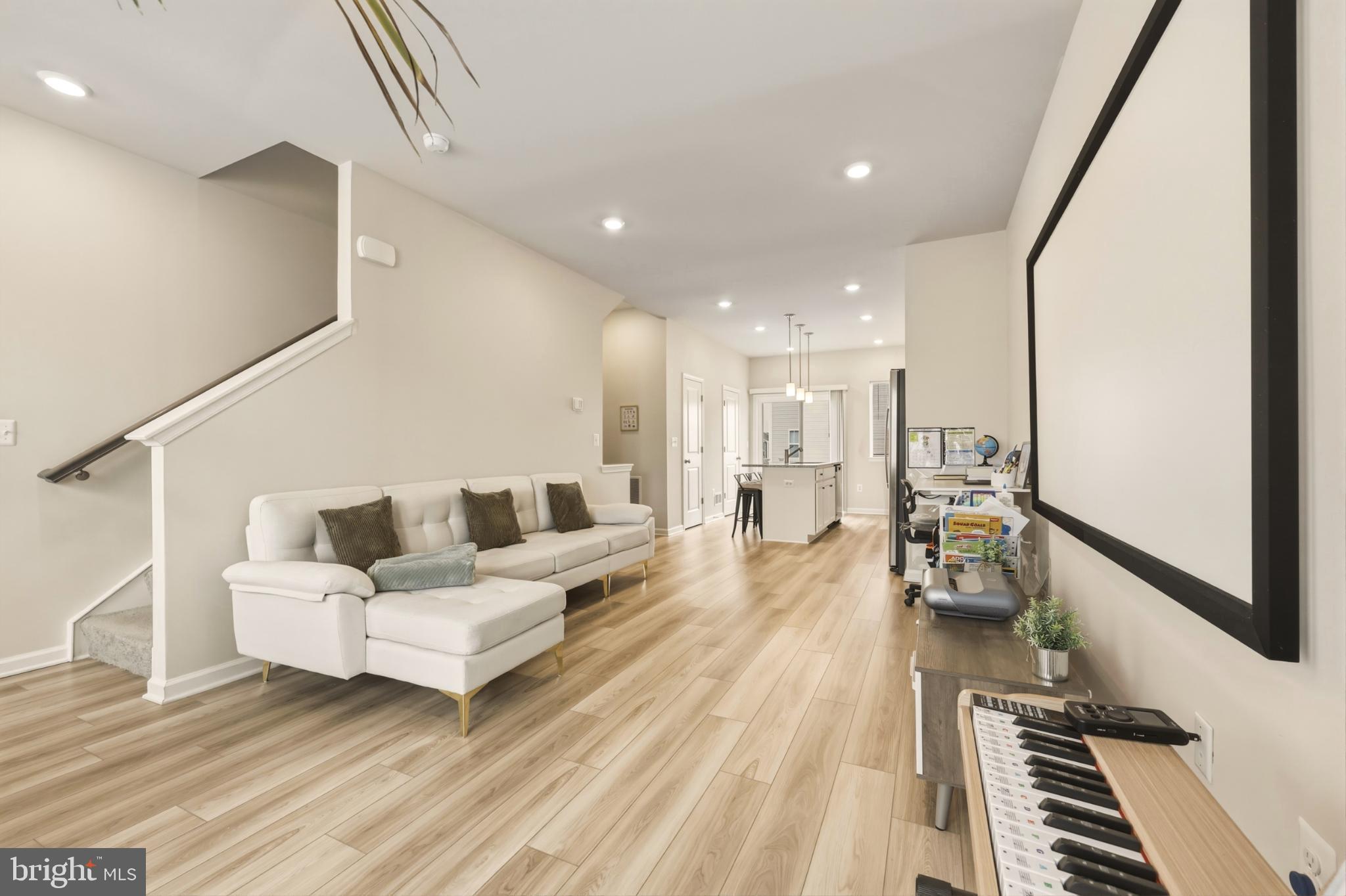 51 Short Br Drive Ranson, WV 25438 - Photo 18 of 30 Spacious modern living area with warm tones.