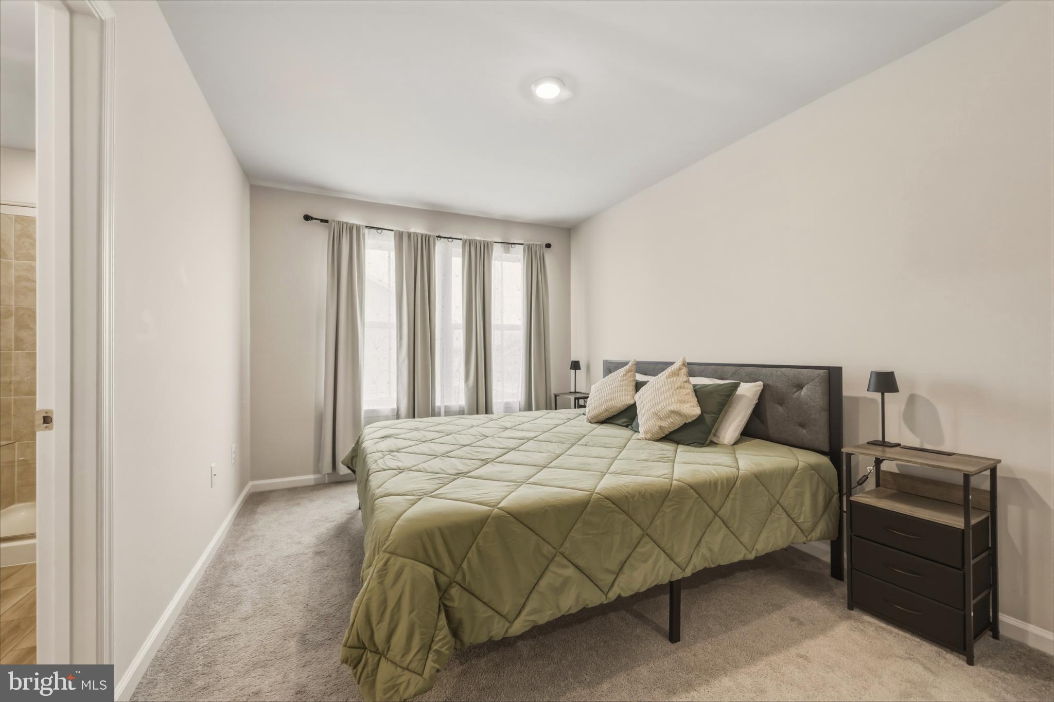 51 Short Br Drive Ranson, WV 25438 - Photo 20 of 30 Serene bedroom with natural light.