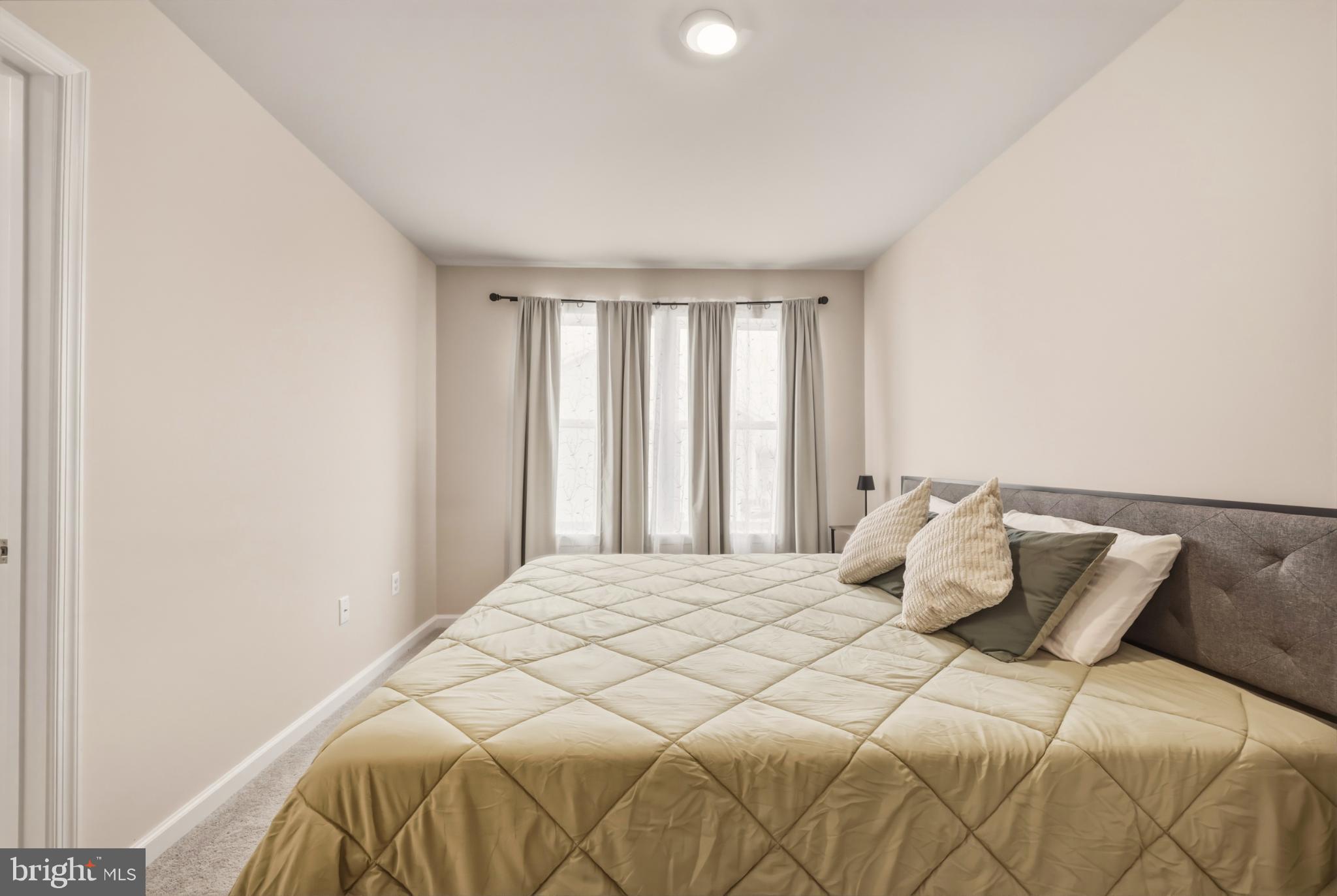 51 Short Br Drive Ranson, WV 25438 - Photo 21 of 30 Serene bedroom with natural light and charm.