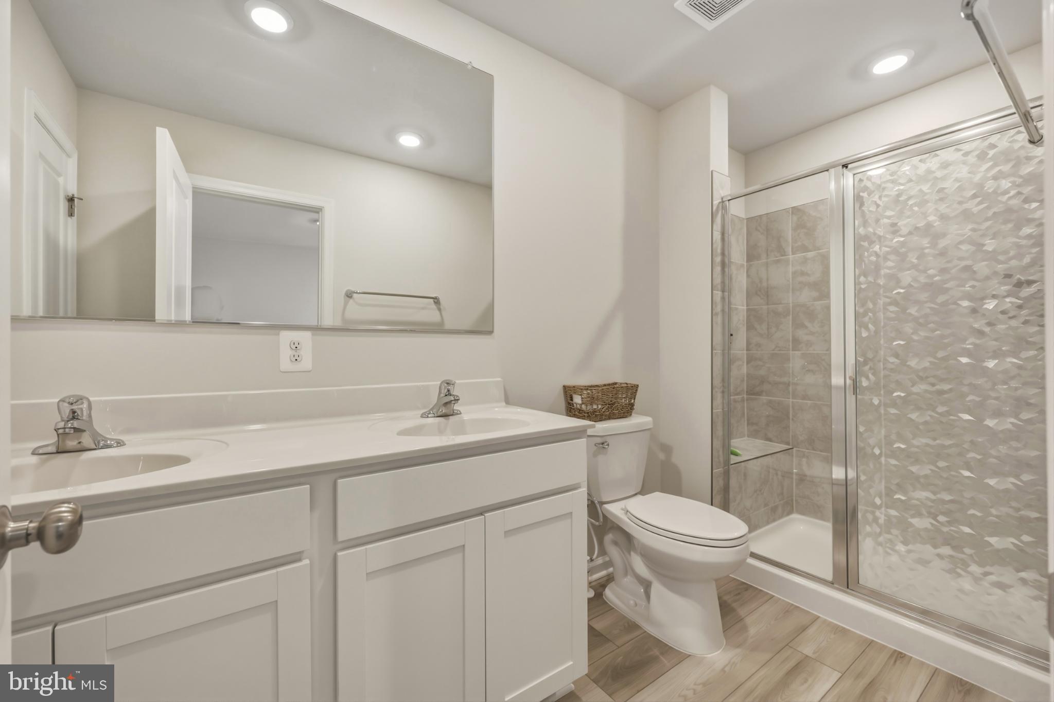 51 Short Br Drive Ranson, WV 25438 - Photo 23 of 30 Modern bathroom with sleek finishes.