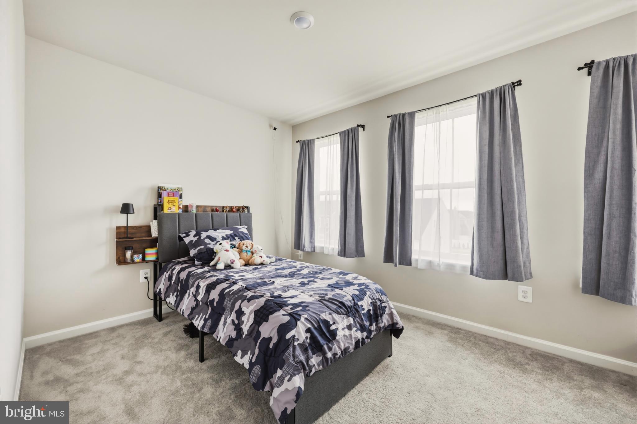 51 Short Br Drive Ranson, WV 25438 - Photo 26 of 30 Cozy bedroom with natural light and style.