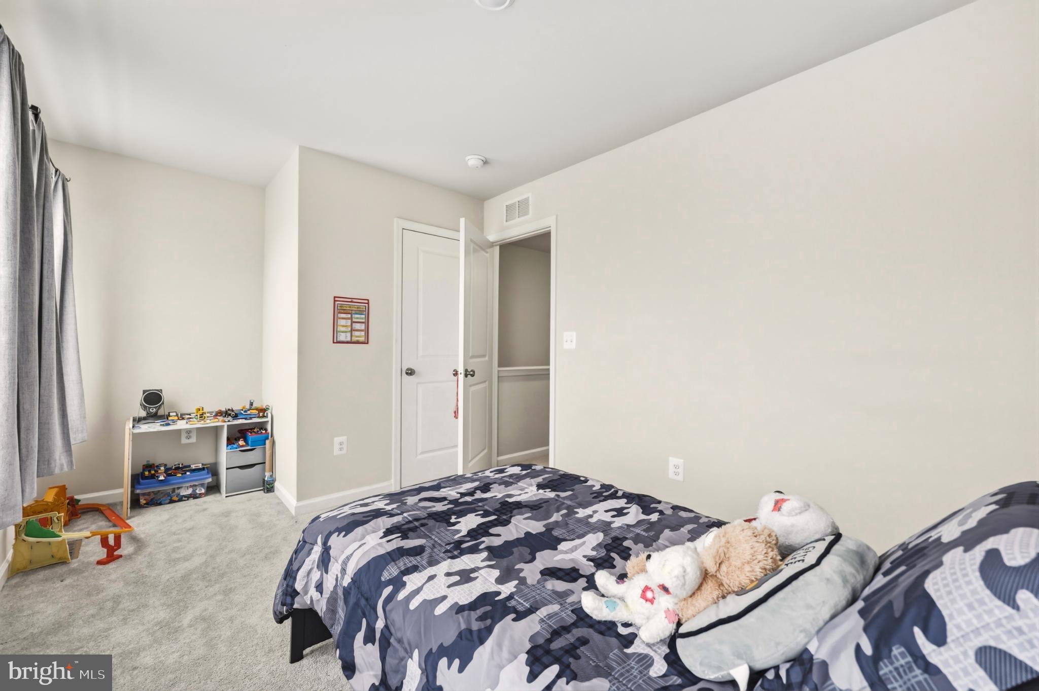 51 Short Br Drive Ranson, WV 25438 - Photo 27 of 30 Cozy children's bedroom with playful decor.