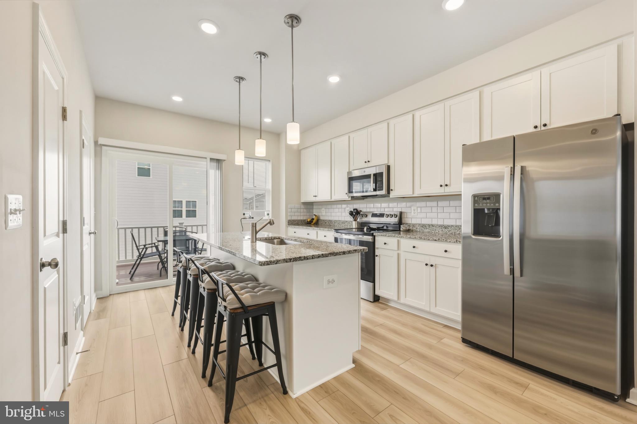 51 Short Br Drive Ranson, WV 25438 - Photo 9 of 30 Modern kitchen with sleek finishes.