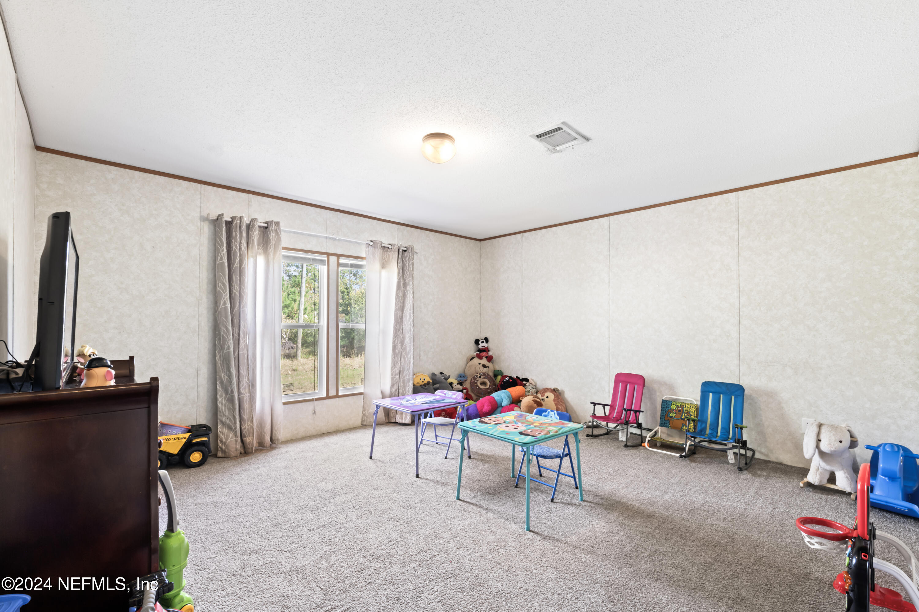 10929 Orbey Rhoden Road Glen St. Mary, FL 32040 - Photo 18 of 25 Family Room/Playroom