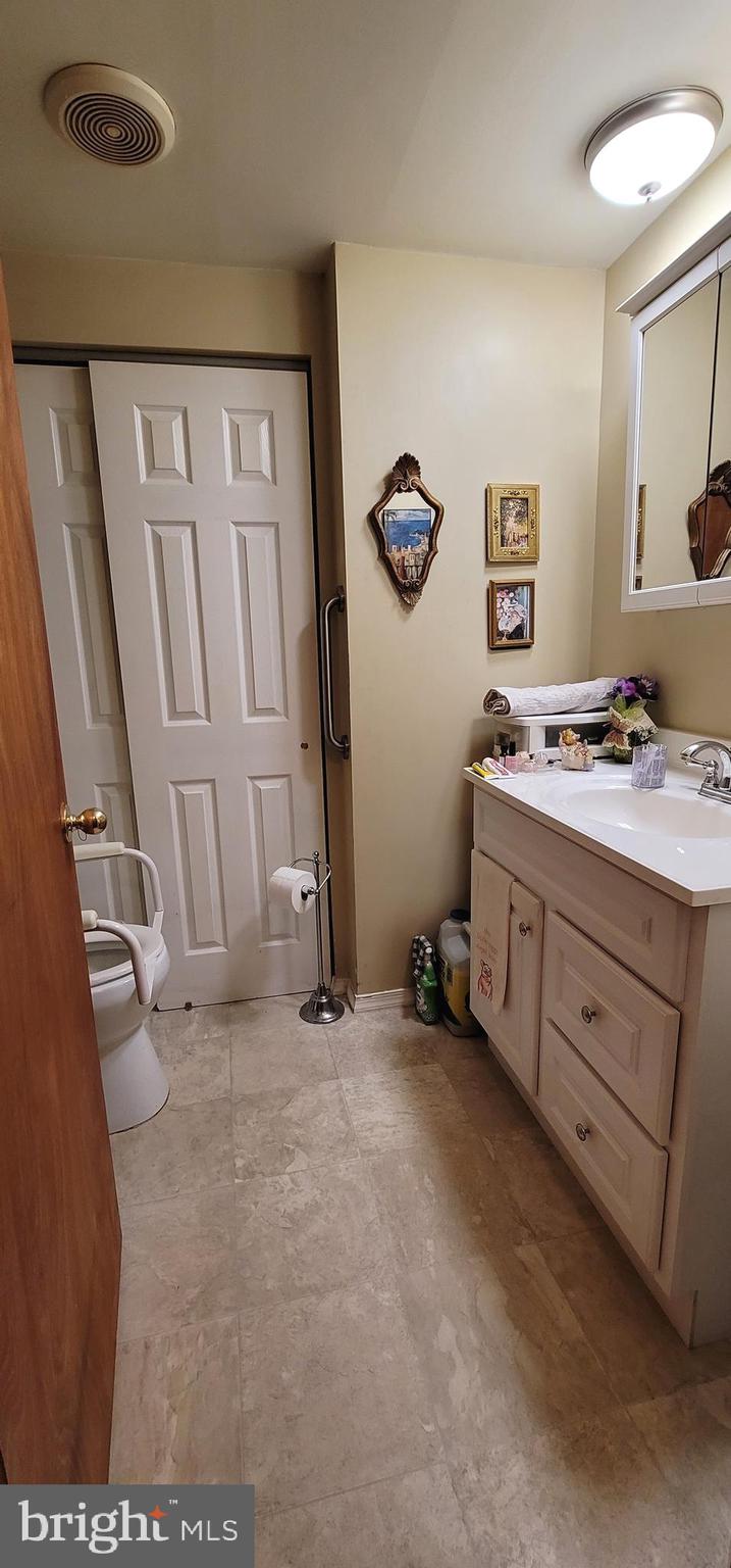130 Country Lane Buena, NJ 08310 - Photo 17 of 41 a bathroom with a sink and a mirror