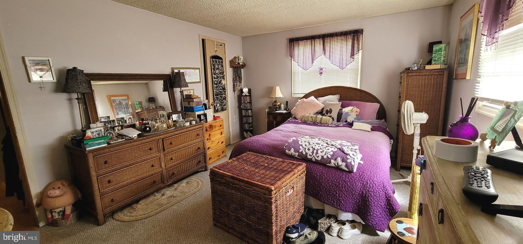130 Country Lane Buena, NJ 08310 - Photo 19 of 41 a bed room with a bed and a dresser
