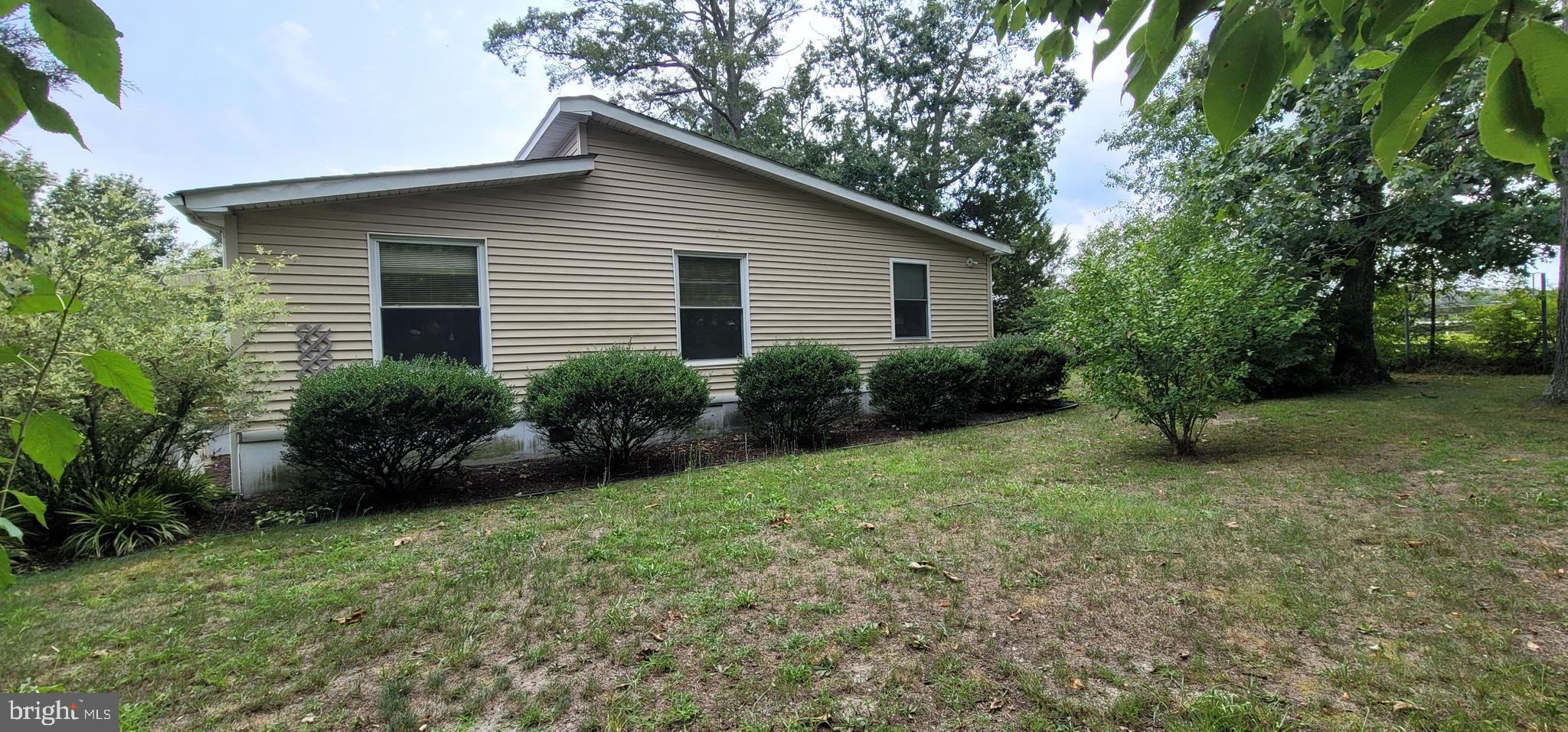130 Country Lane Buena, NJ 08310 - Photo 23 of 41 a view of a house with yard and plants