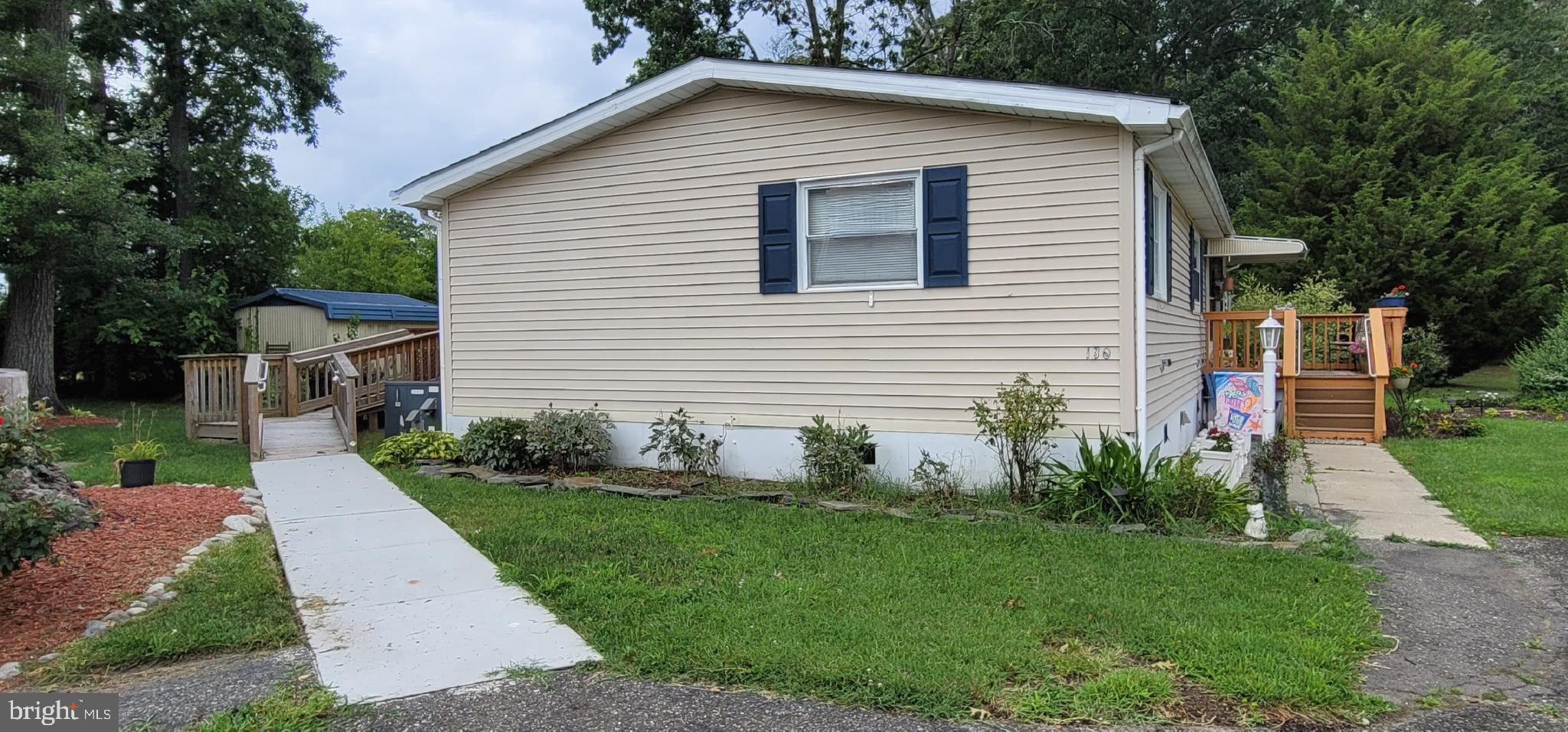 130 Country Lane Buena, NJ 08310 - Photo 26 of 41 a view of a house with a yard