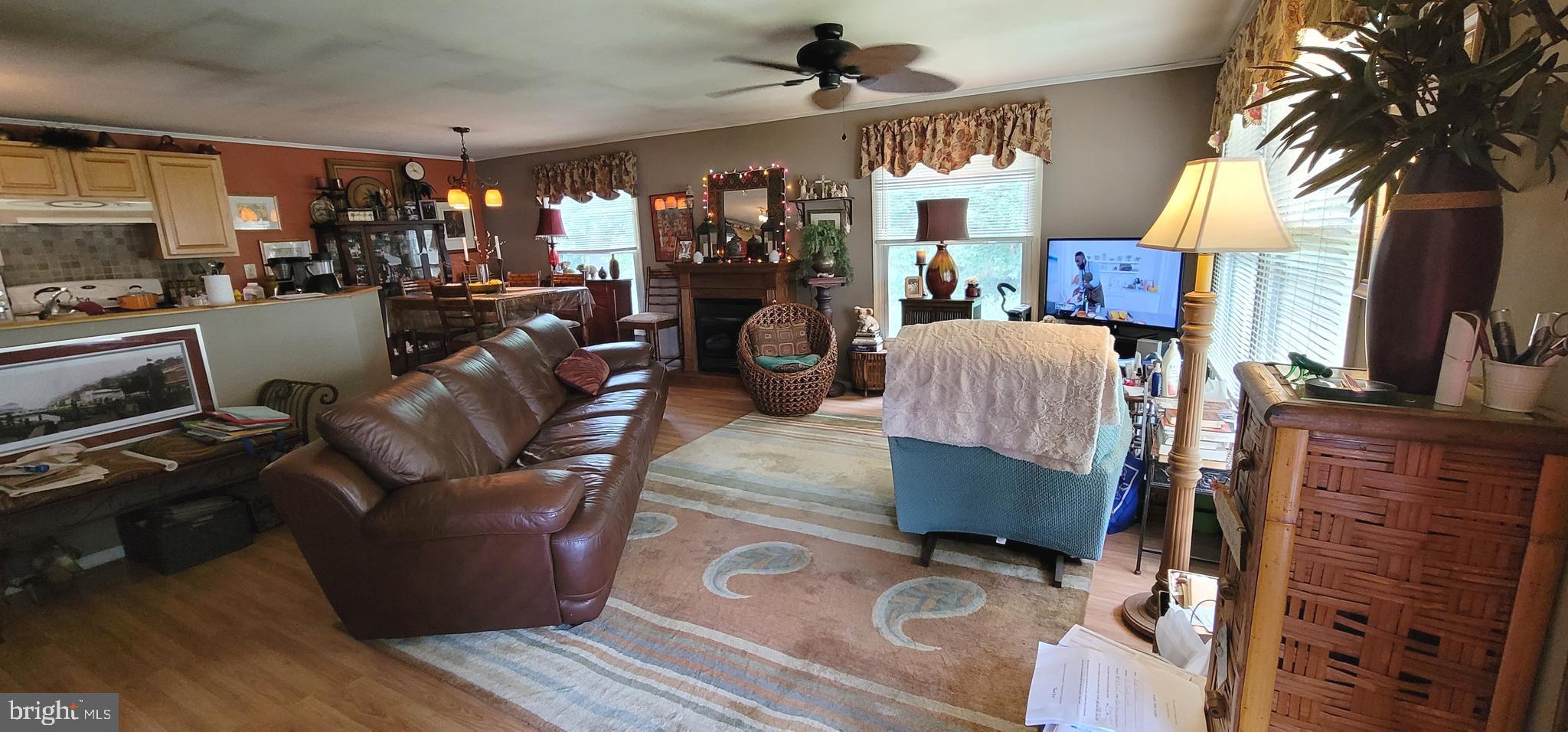 130 Country Lane Buena, NJ 08310 - Photo 3 of 41 a living room with furniture and a flat screen tv