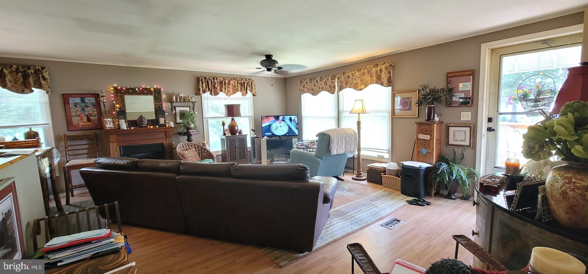 130 Country Lane Buena, NJ 08310 - Photo 4 of 41 a living room with furniture and a large window