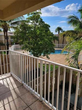a view of a wooden fence