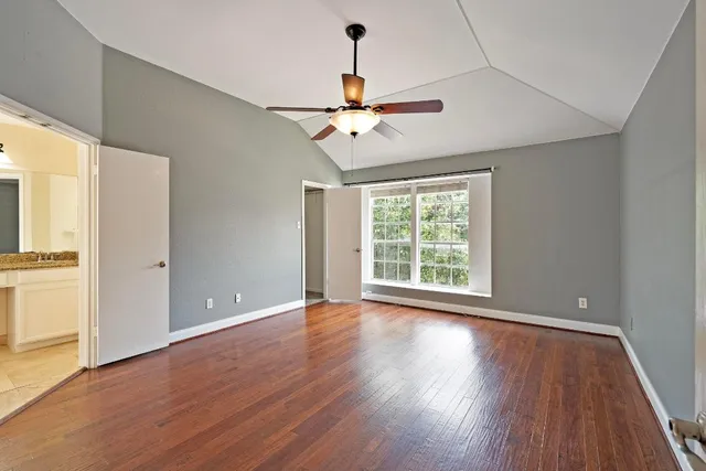 a view of a kitchen counter space a sink and appliances