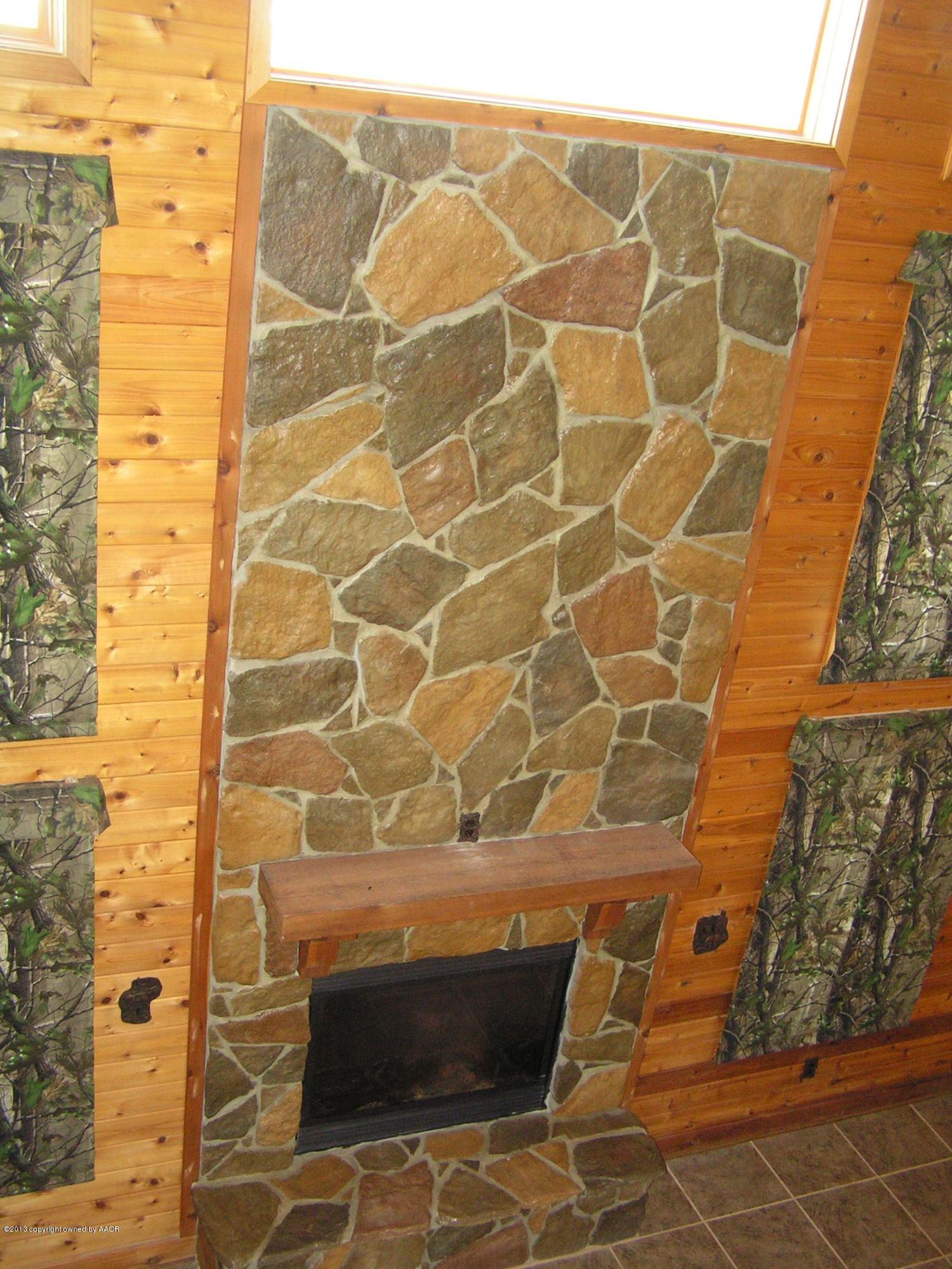 6670 Red Rock Road Amarillo, TX 79118 - Photo 31 of 71 DEN FIREPLACE