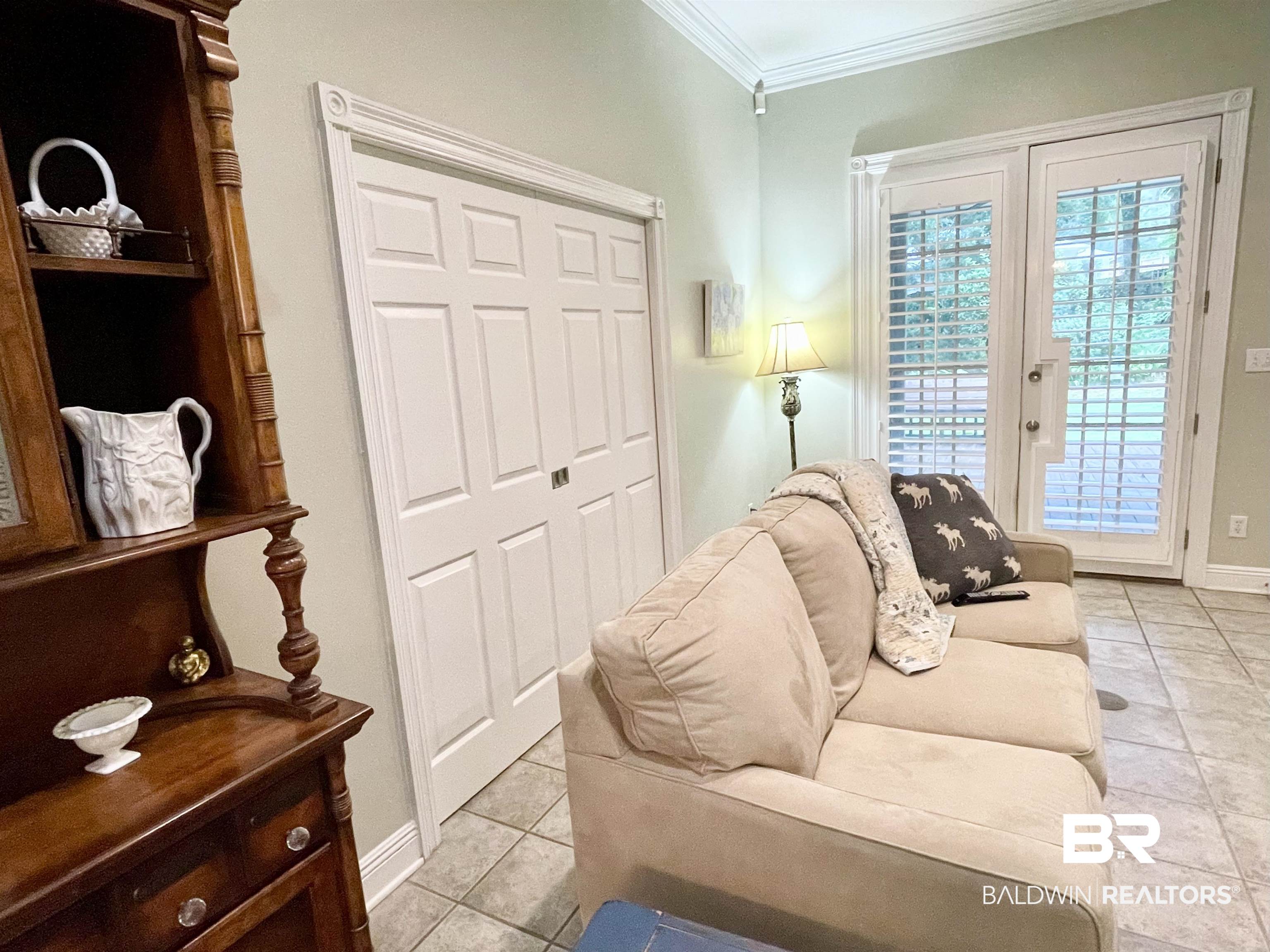 202 Potters Mills Road Daphne, AL 36526 - Photo 5 of 29 Double pocket doors lead to Kitchen