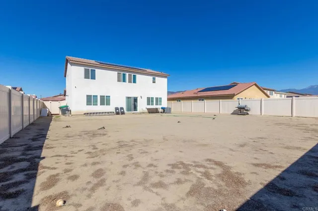 a view of house with wooden deck and living room
