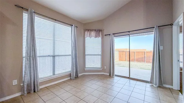 a view of an empty room with window