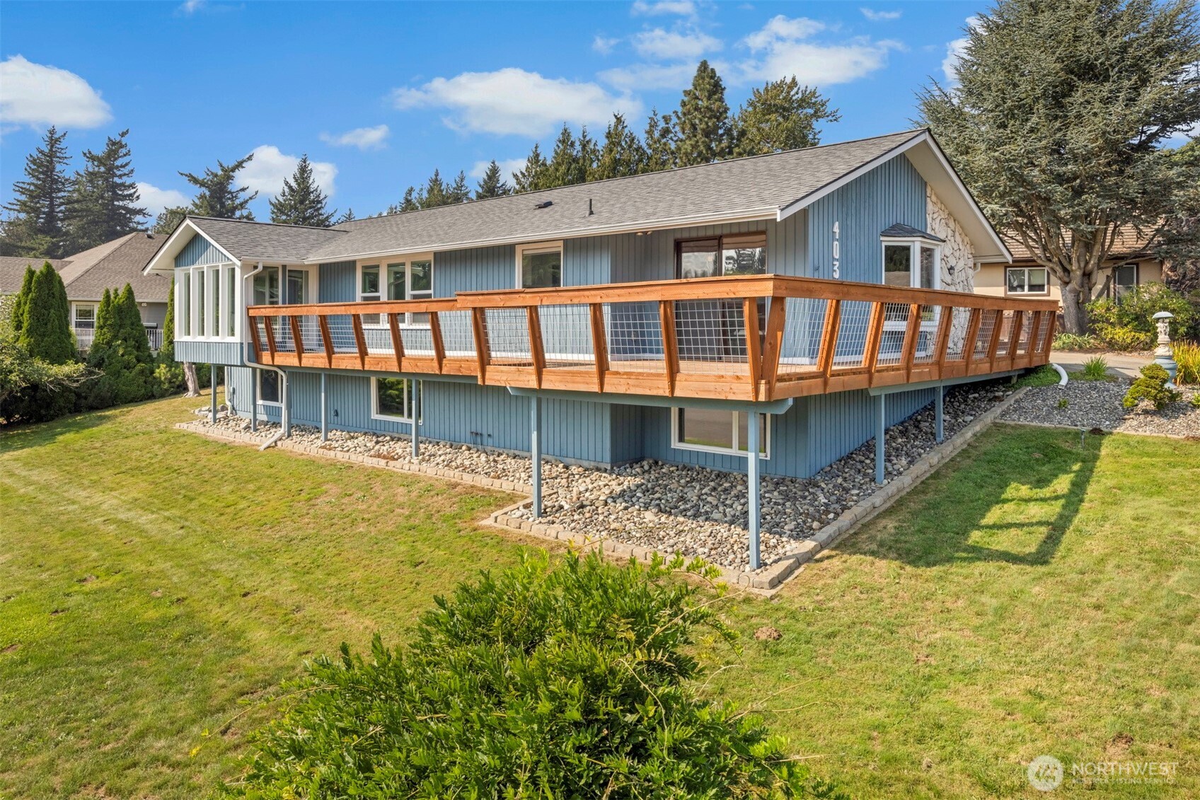 403 17th Street Lynden, WA 98264 - Photo 1 of 40 a view of a house with roof deck