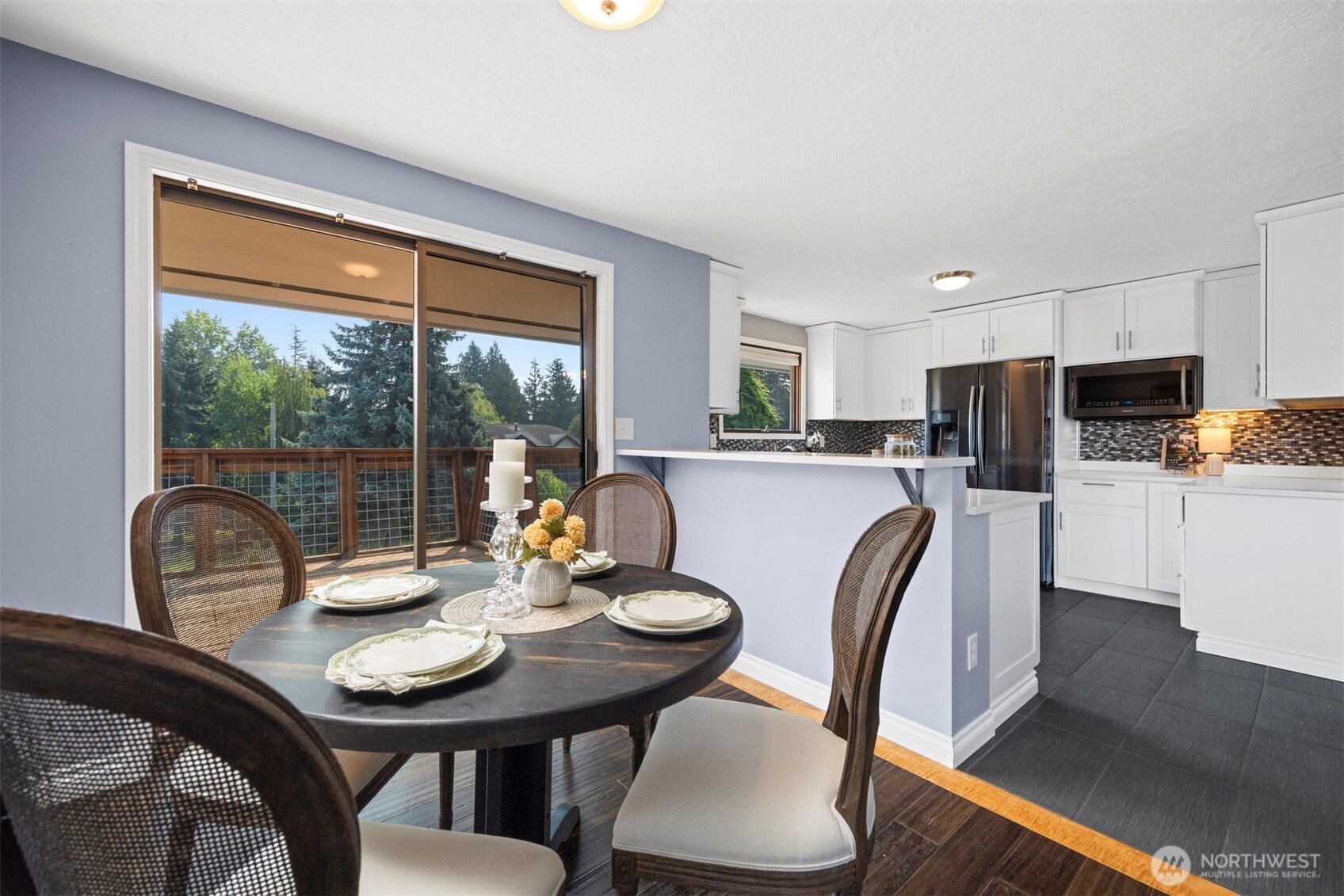403 17th Street Lynden, WA 98264 - Photo 12 of 40 a view of a dining room with furniture window and outside view