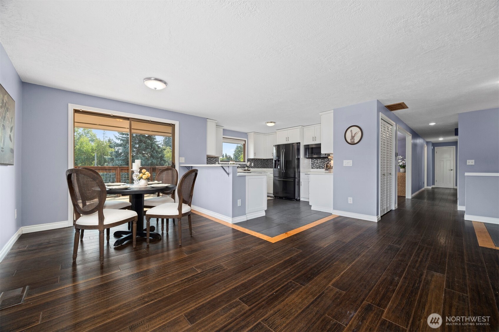 403 17th Street Lynden, WA 98264 - Photo 13 of 40 a view of a dining room with furniture and wooden floor