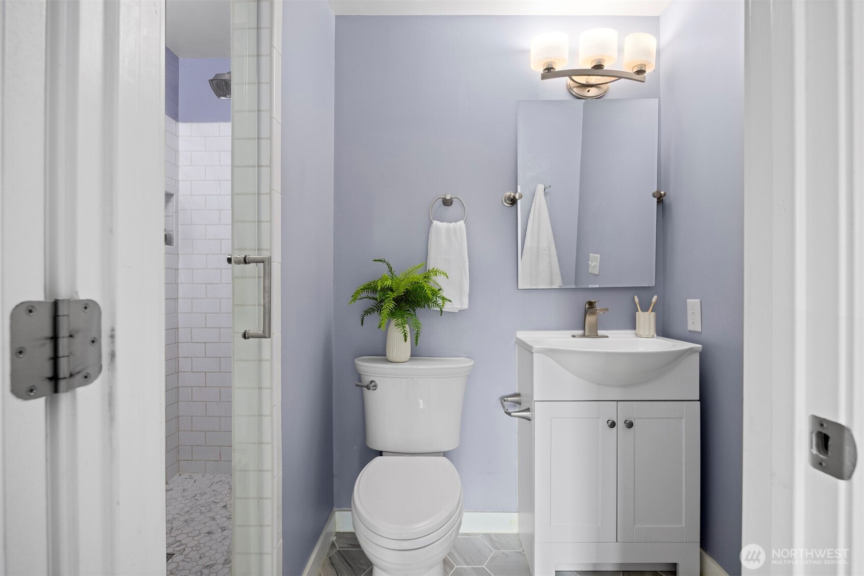 403 17th Street Lynden, WA 98264 - Photo 20 of 40 a bathroom with a toilet a sink and shower