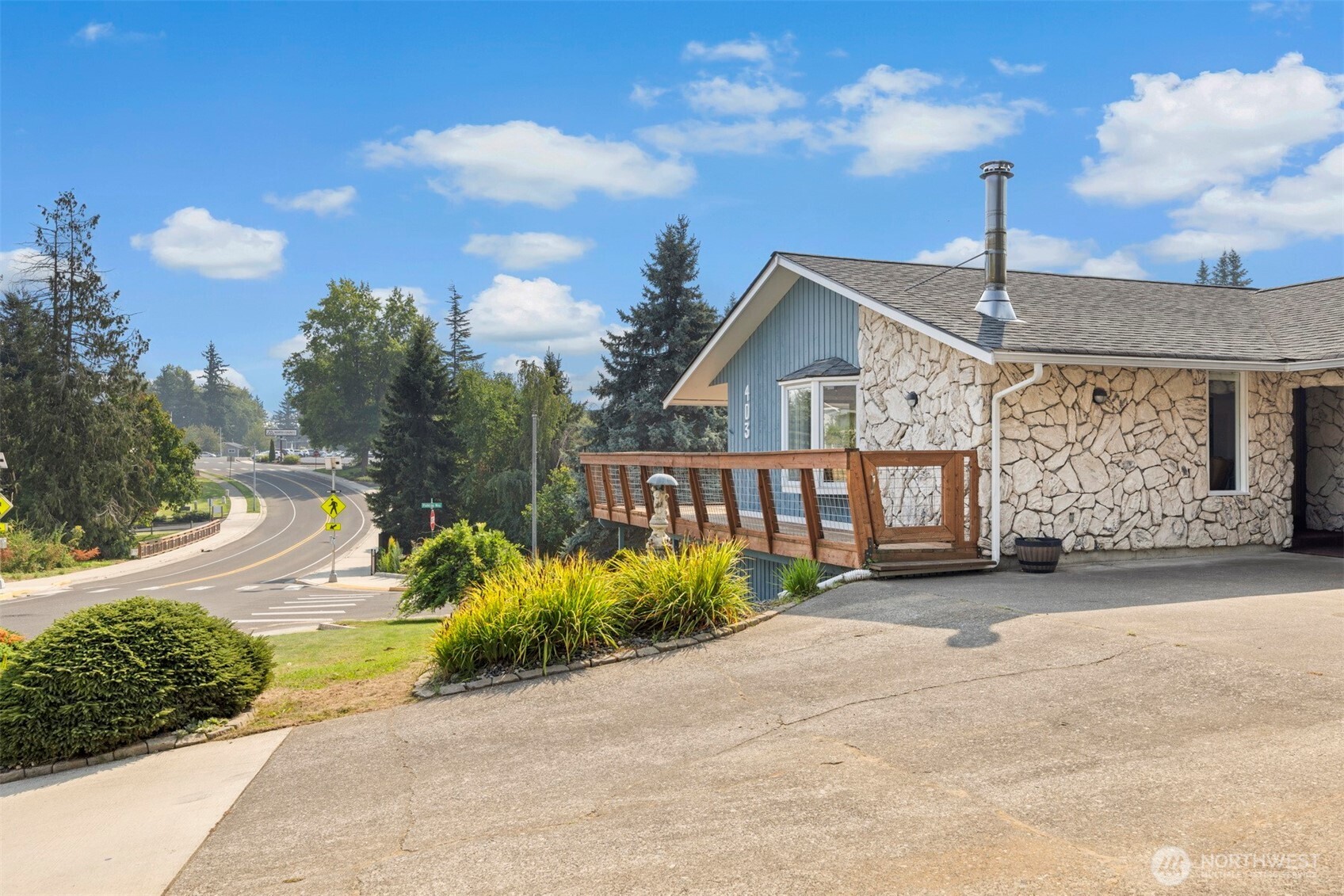 403 17th Street Lynden, WA 98264 - Photo 33 of 40 a front view of a house with a yard and trees