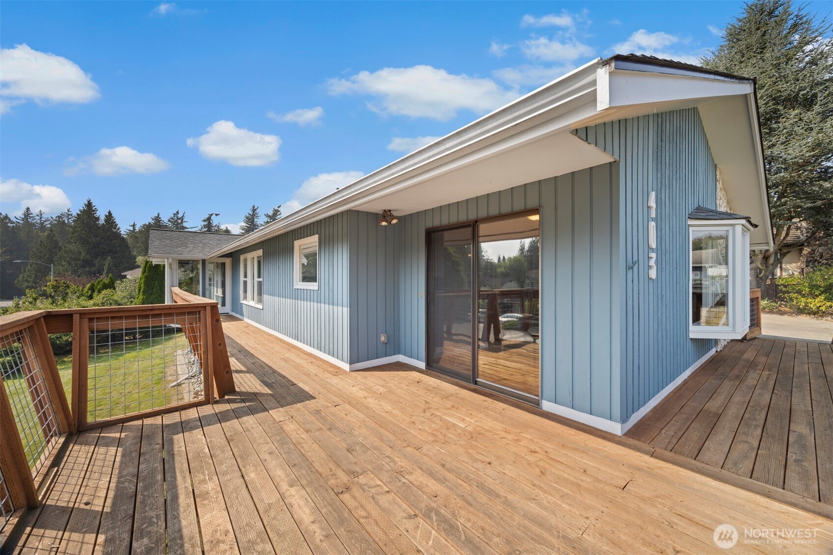 403 17th Street Lynden, WA 98264 - Photo 35 of 40 a balcony with wooden floor and floors