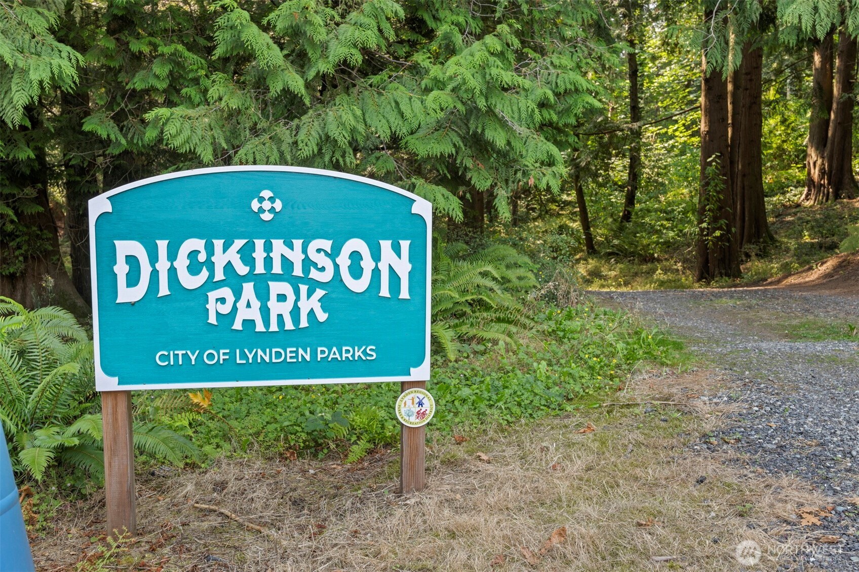 403 17th Street Lynden, WA 98264 - Photo 37 of 40 a sign that is sitting on a brick wall