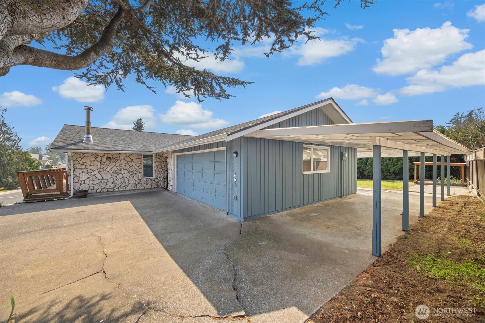 403 17th Street Lynden, WA 98264 - Photo 40 of 40 a view of a house with a backyard and balcony