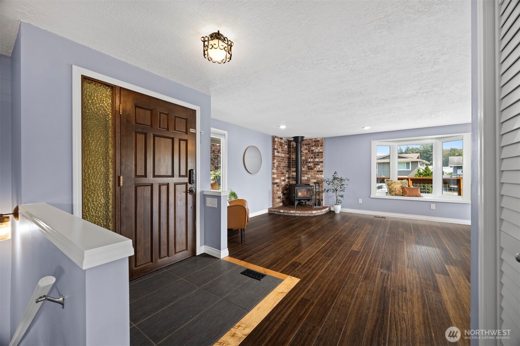 403 17th Street Lynden, WA 98264 - Photo 8 of 40 wooden floor with a window in a room