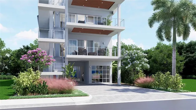 front view of a brick house with a yard