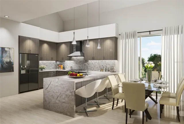 a view of a dining room with furniture