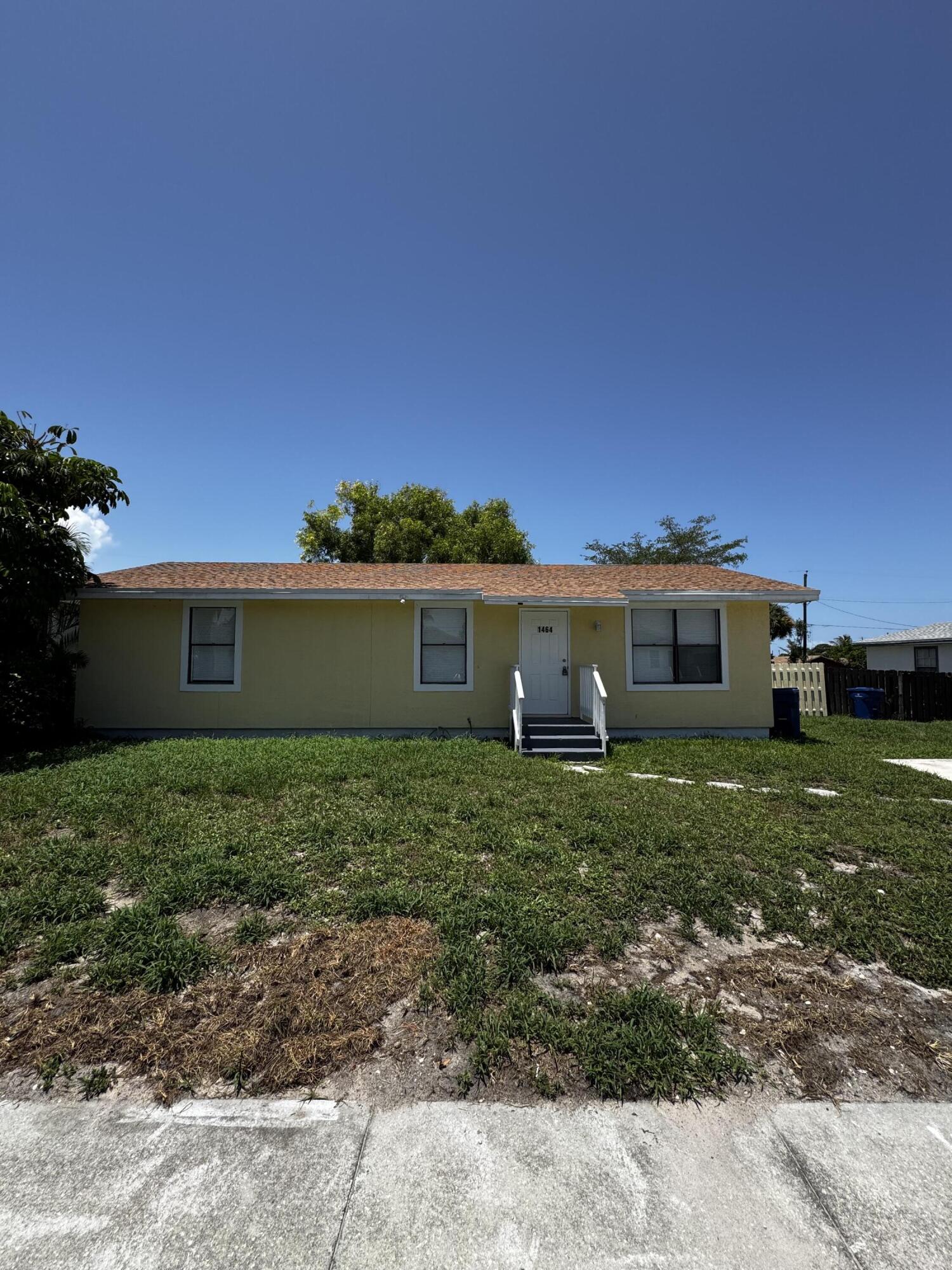 1464 West 32nd Street Riviera Beach, FL 33404 - Photo 2 of 28 front