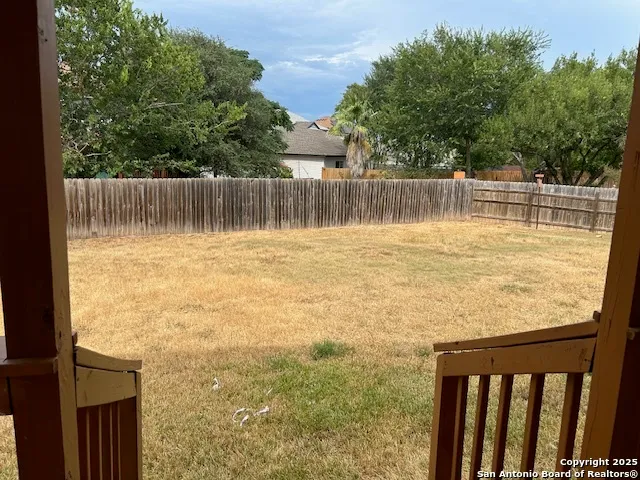 a view of a lake from a yard