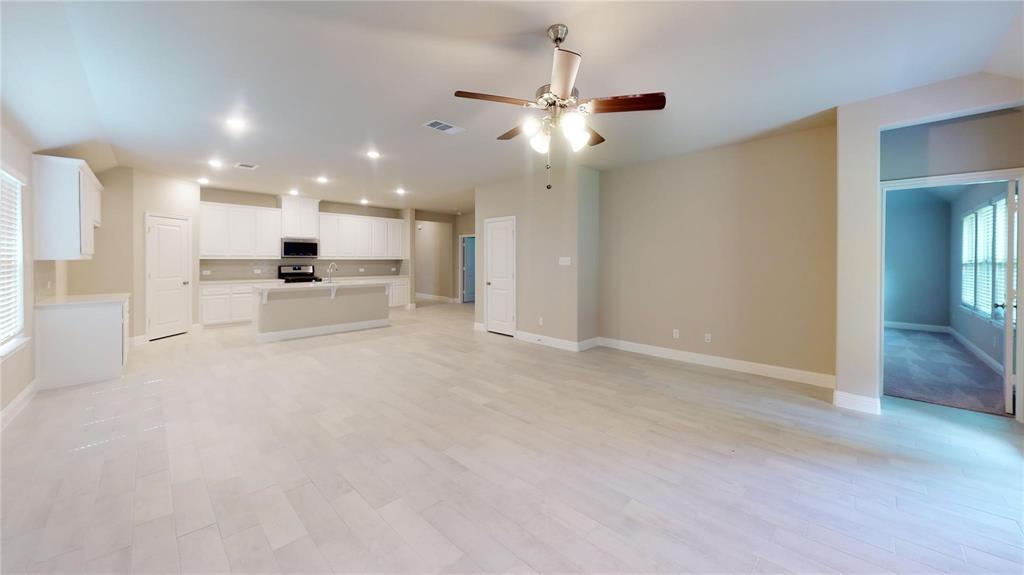 1420 Elizabeth Street Anna, TX 75409 - Photo 6 of 18 a view of large kitchen with stainless steel appliances cabinets