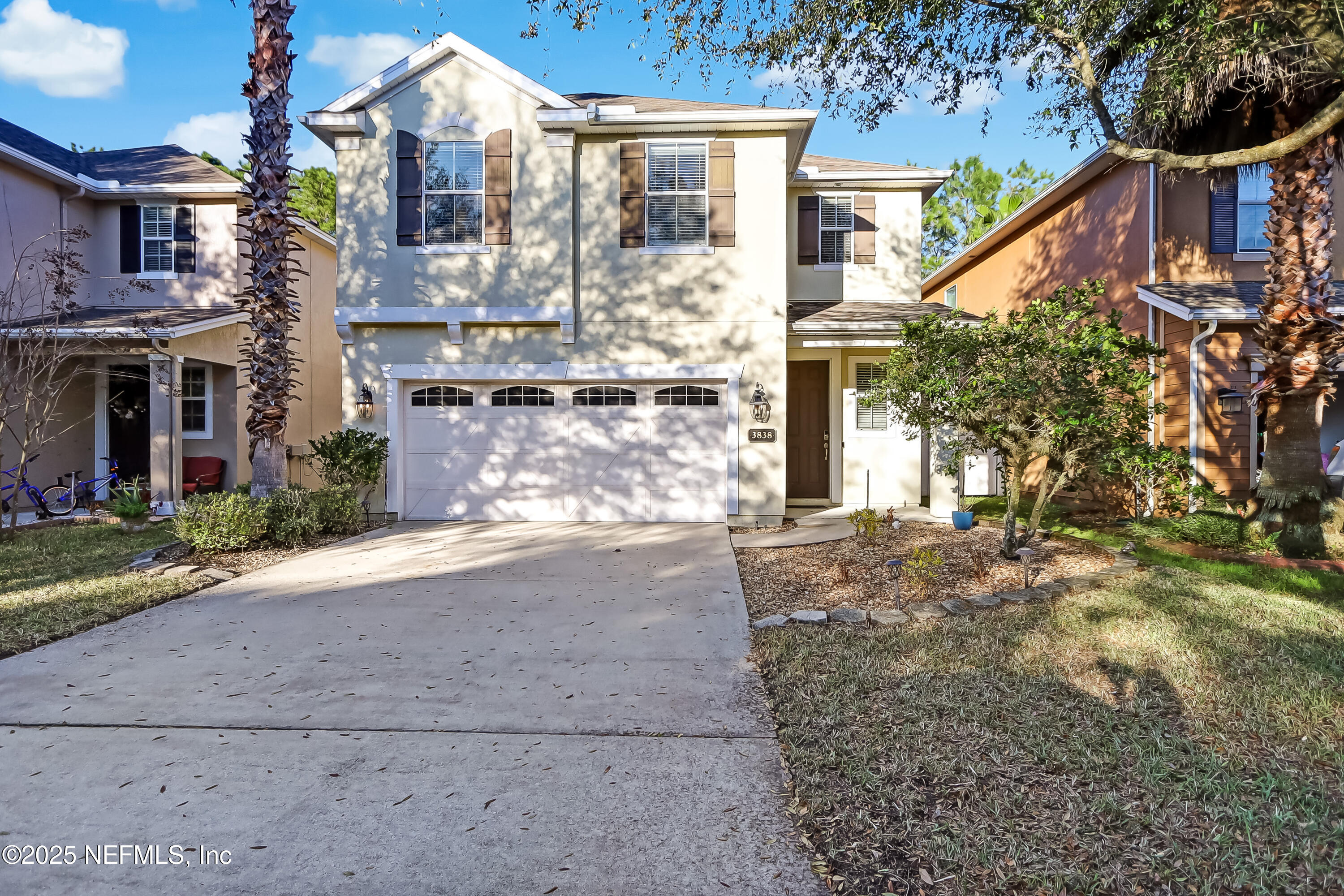 3838 Chasing Falls Road Orange Park, FL 32065 - Photo 1 of 36 a front view of a house with a yard