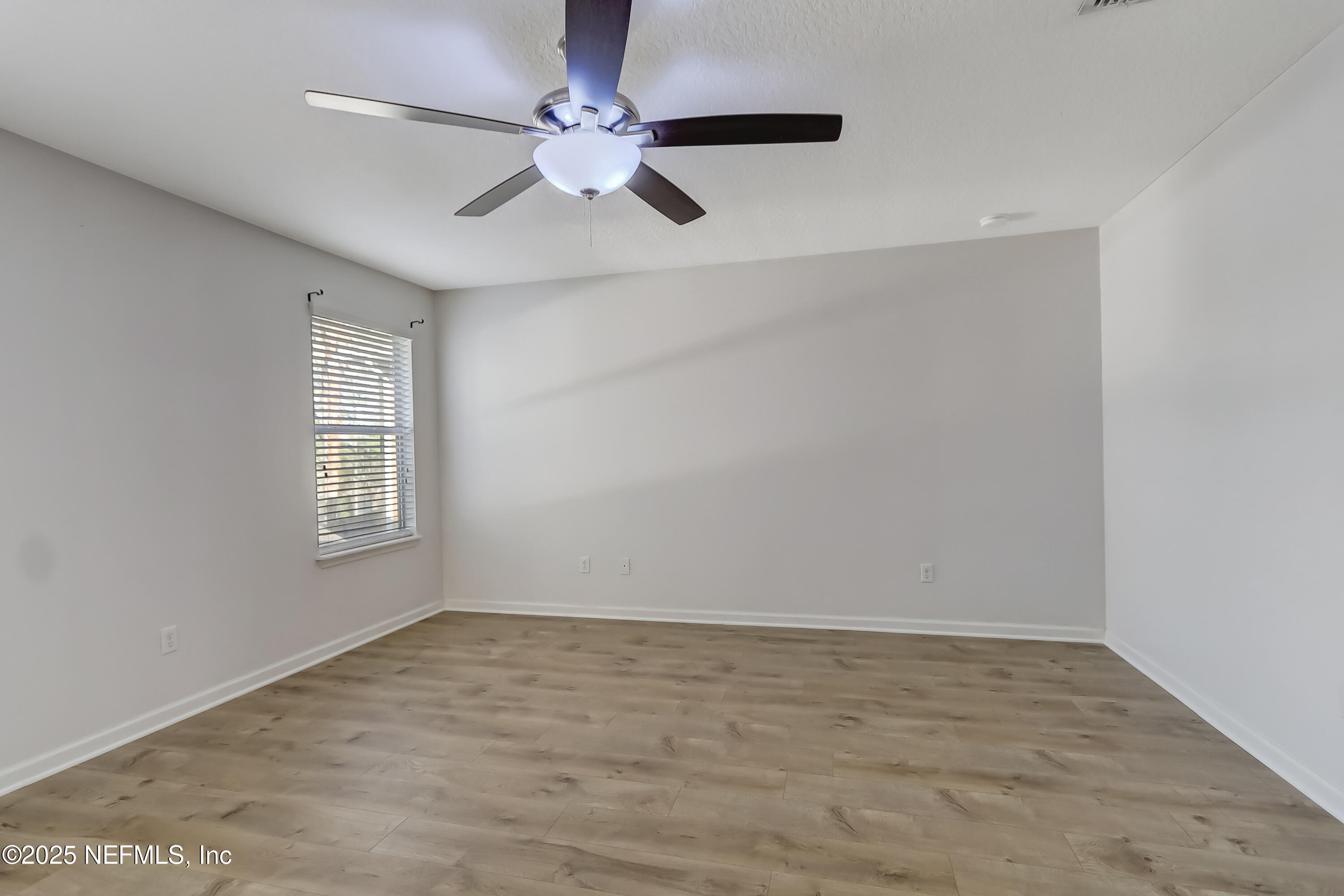 3838 Chasing Falls Road Orange Park, FL 32065 - Photo 20 of 36 a view of an empty room with a window