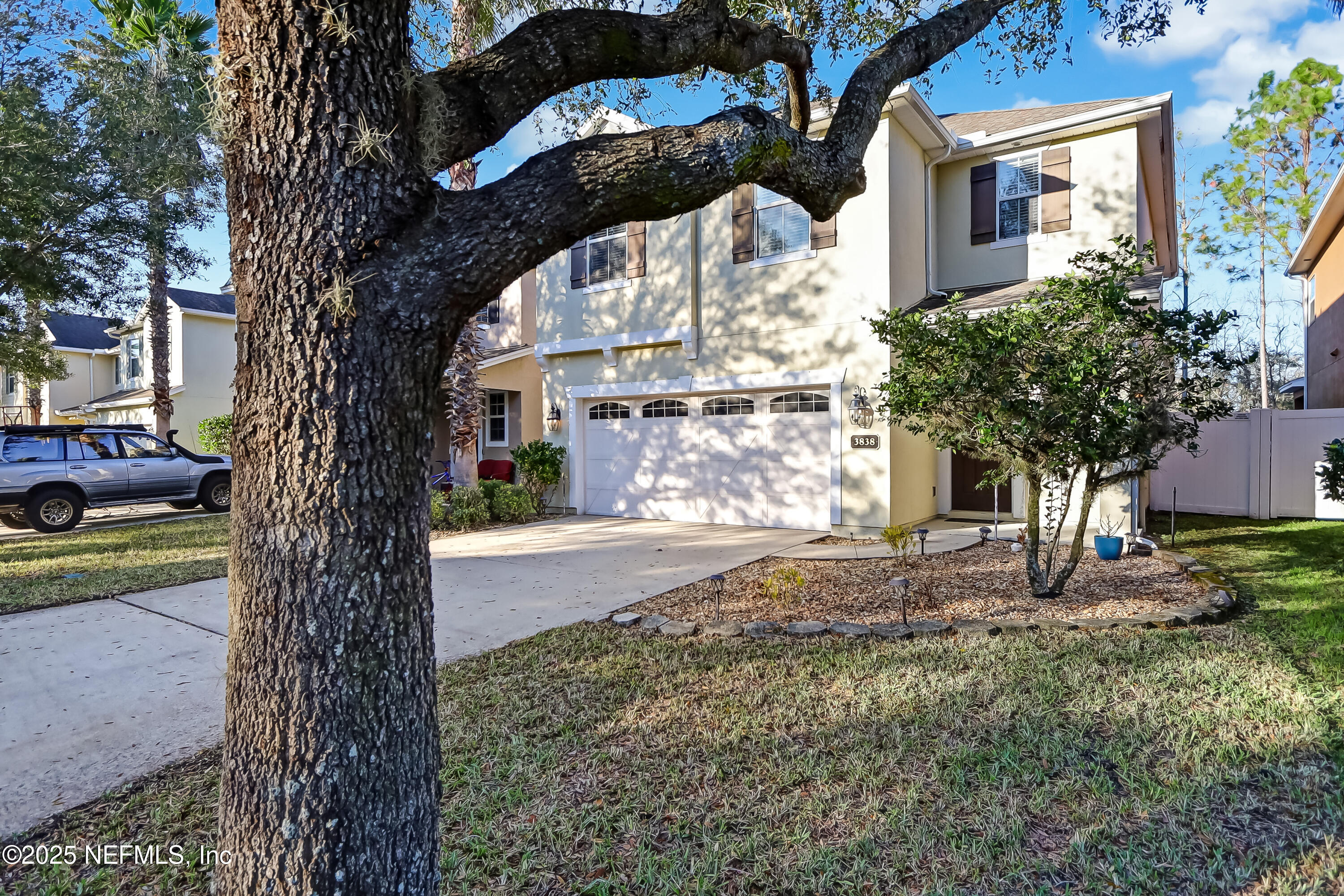 3838 Chasing Falls Road Orange Park, FL 32065 - Photo 2 of 36 a front view of a house with a yard