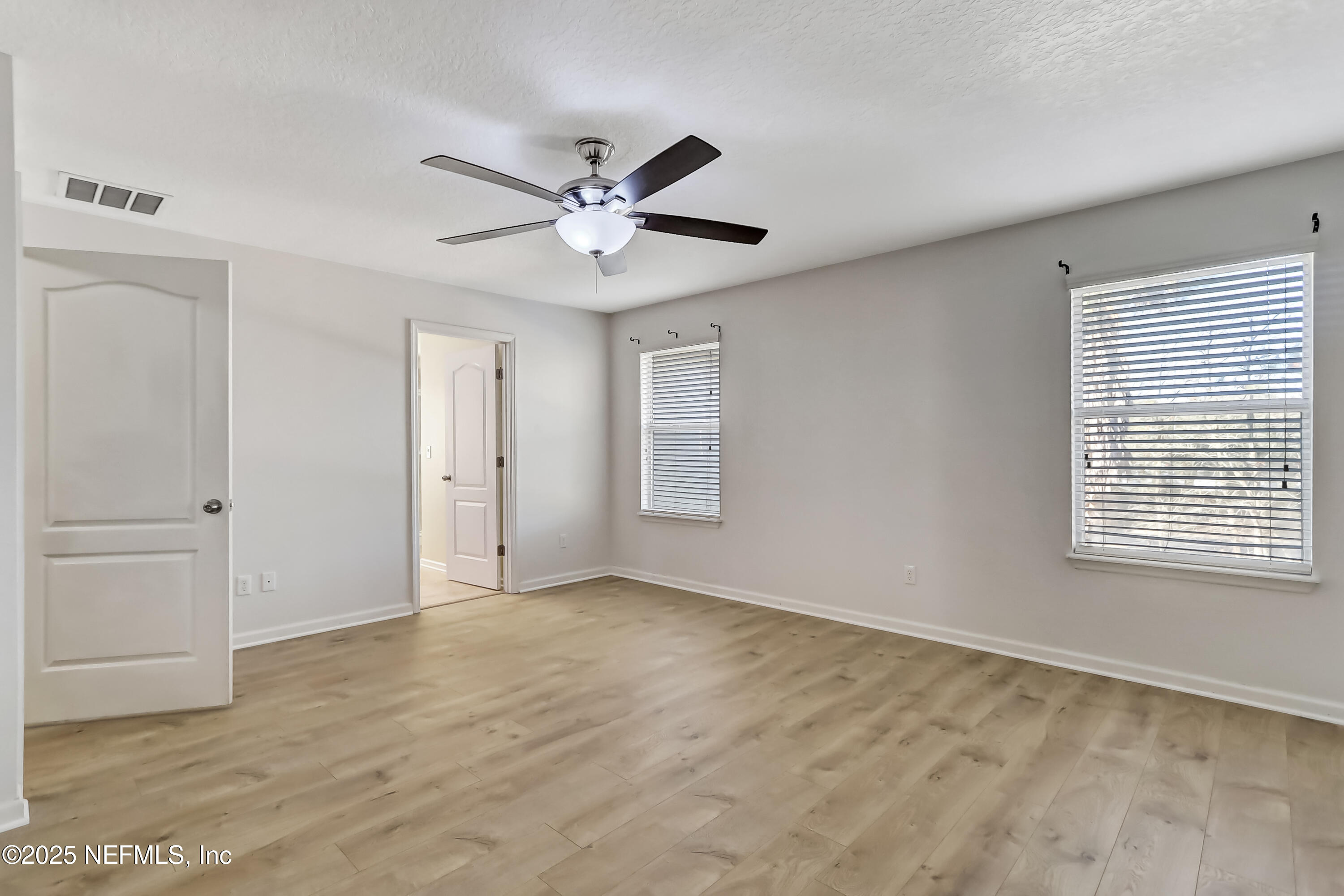 3838 Chasing Falls Road Orange Park, FL 32065 - Photo 21 of 36 a view of an empty room with a window