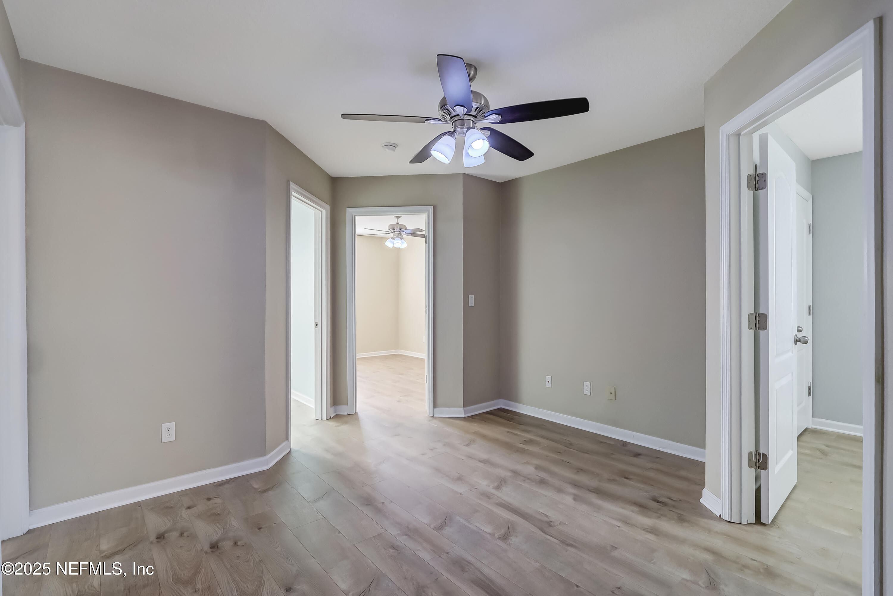 3838 Chasing Falls Road Orange Park, FL 32065 - Photo 25 of 36 wooden floor in an empty room with a window