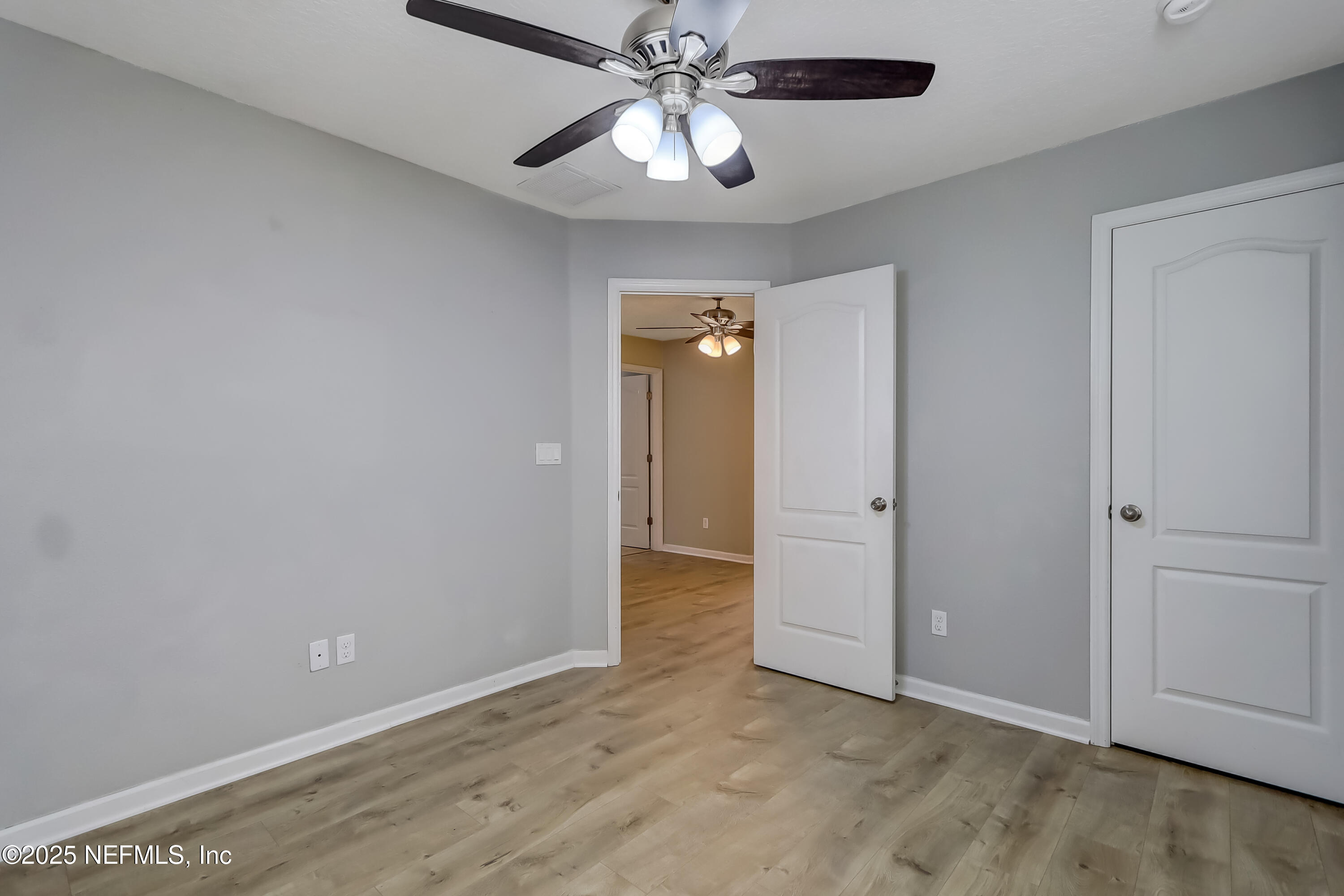 3838 Chasing Falls Road Orange Park, FL 32065 - Photo 33 of 36 a view of an empty room and chandelier fan