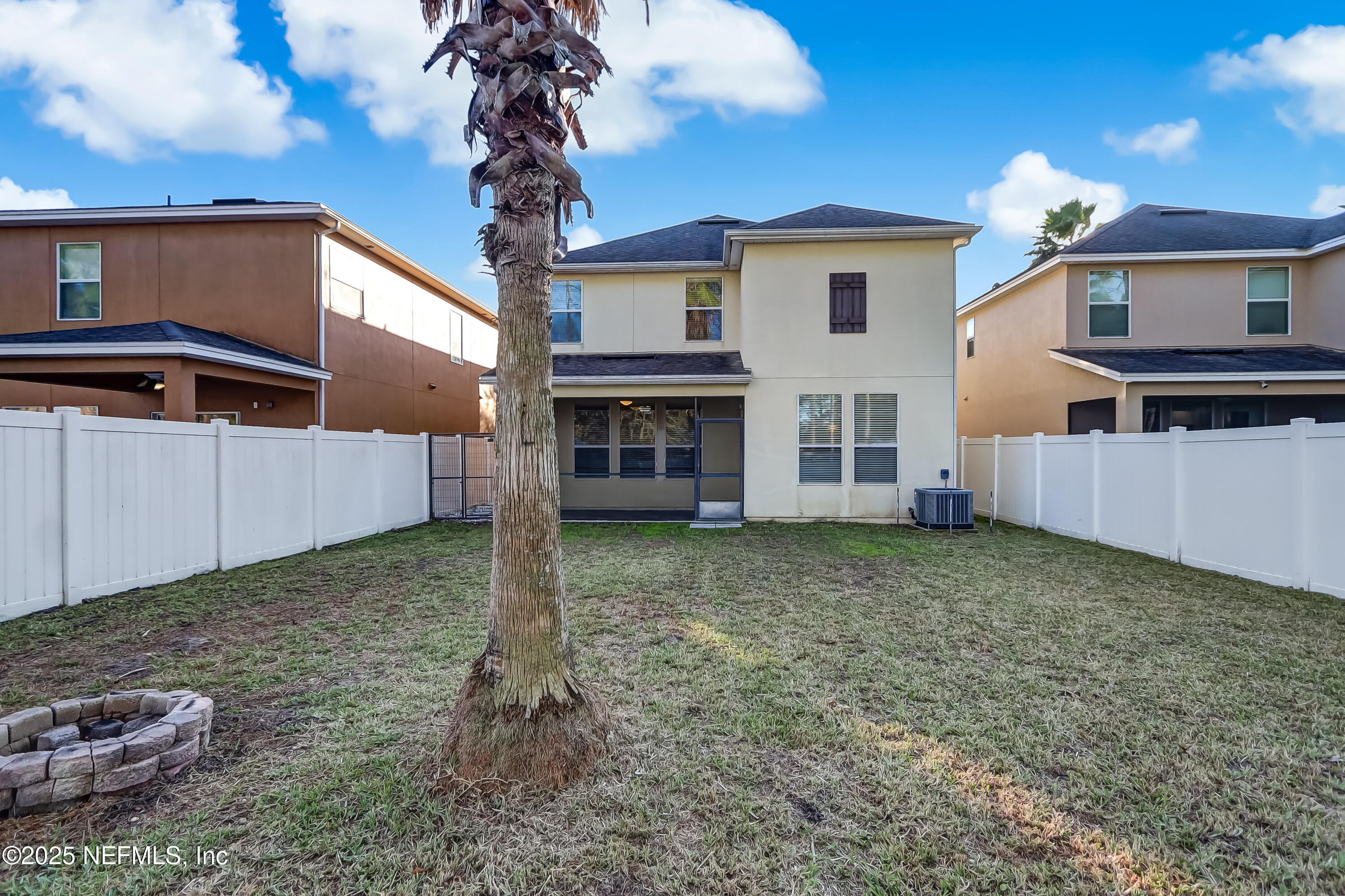 3838 Chasing Falls Road Orange Park, FL 32065 - Photo 36 of 36 a view of a house with a yard